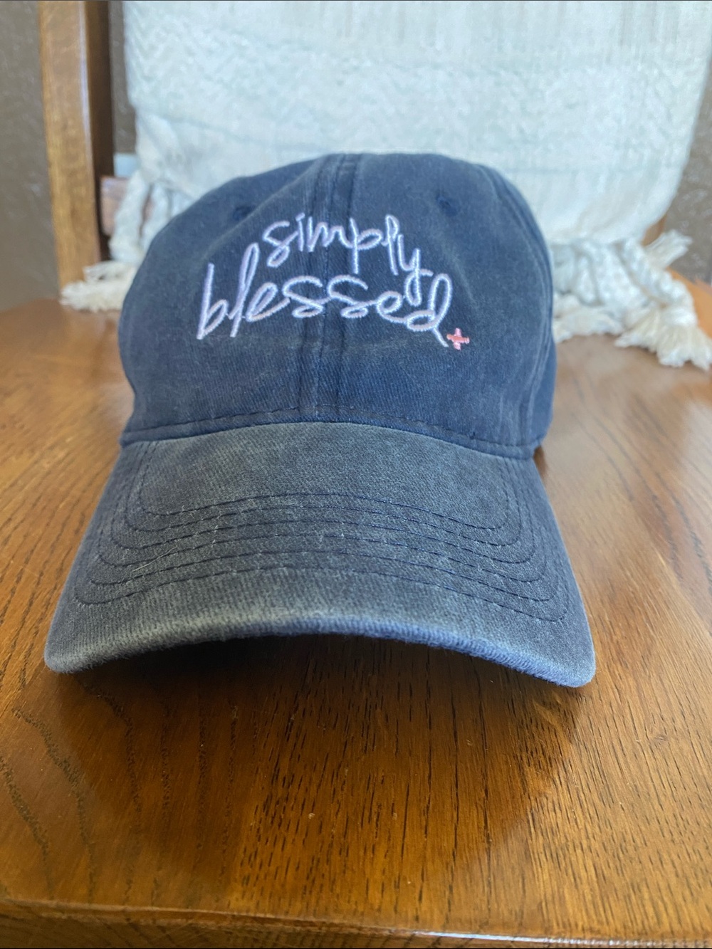 Simply blessed hat. Denim washed blue with white letters and pink cross